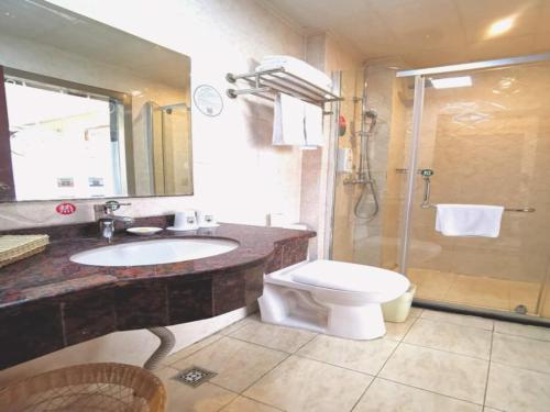 Koupelna v ubytování GreenTree Inn JiangSu WuXi BaShi HuaXiaQingCheng XiGang Road Shell Hotel