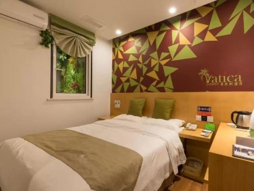 Katil atau katil-katil dalam bilik di Vatica Xuzhou High Speed Railway Station Hotel