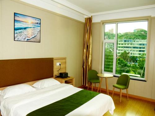 Voodi või voodid majutusasutuse GreenTree Inn Shanxi Taiyuan Gujiao East Dachuan Road Express Hotel toas