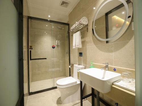 Ένα μπάνιο στο Shell Xinzheng Airport Port Huaxia Avenue Hotel