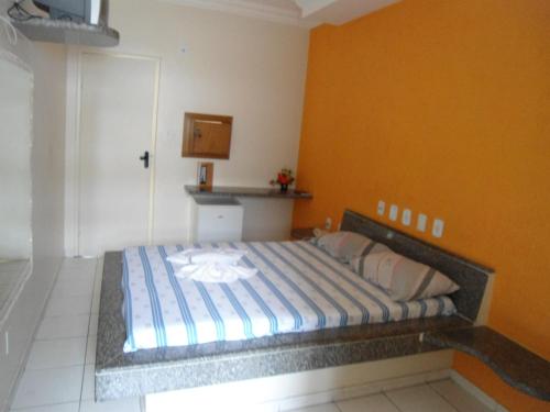 Postel nebo postele na pokoji v ubytování Hotel Piramide - Dois de Julho (Adult Only)