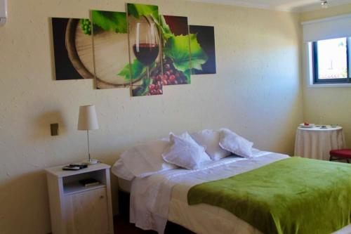 Giường trong phòng chung tại Hotel San Fernando