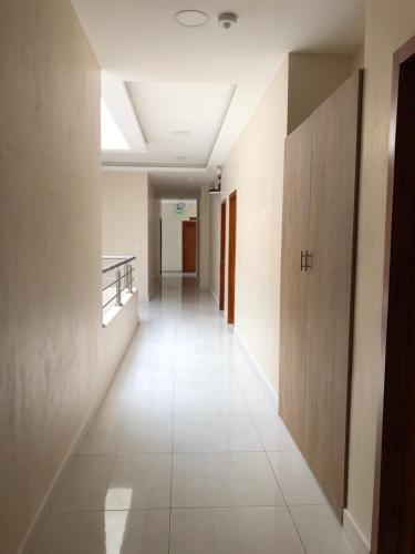 a corridor of an office building with a long hallway at Hotel Arena Blanca in Salinas