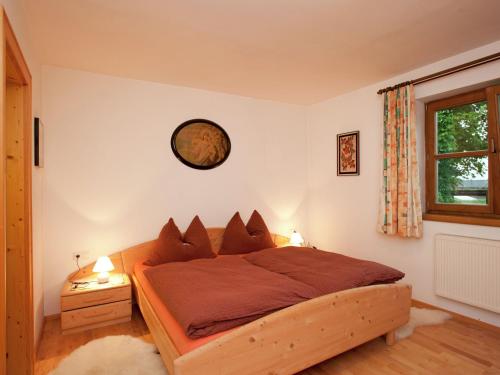 Llit o llits en una habitació de Cozy apartment with balcony in Mittersill