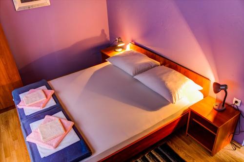 Ένα ή περισσότερα κρεβάτια σε δωμάτιο στο Rooms Daniela