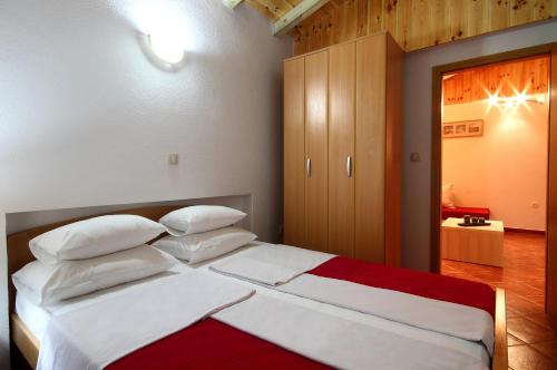 Harmonia Bungalows & Poolにあるベッド