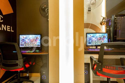 Jinju GnG Motelにあるテレビまたはエンターテインメントセンター