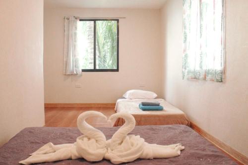 Postel nebo postele na pokoji v ubytování Rio Beach Resort
