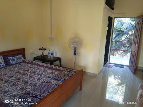 En eller flere senger på et rom på Athang sea face home stay