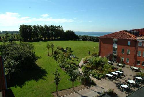 an aerial view of a large green field next to a building at Sundsgården hotell & konferens in Helsingborg