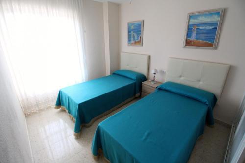 Krevet ili kreveti u jedinici u okviru objekta Apartamento Las Torres
