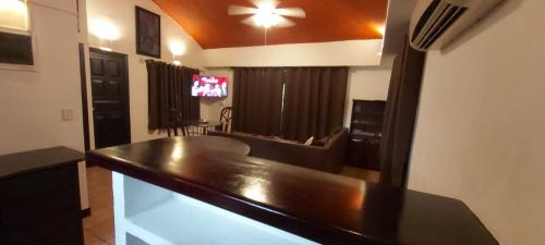 a kitchen with a counter top in a room at Massai Apartments in Playa Flamingo