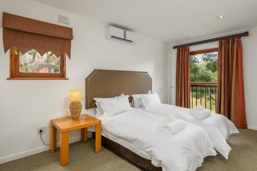 Ένα ή περισσότερα κρεβάτια σε δωμάτιο στο San Lameer Villa 10301 - 4 Bedroom Classic - 8 pax - San Lameer Rental Agency