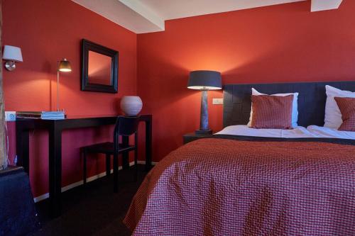 Boutique B&B Hoeve de Haarにあるベッド