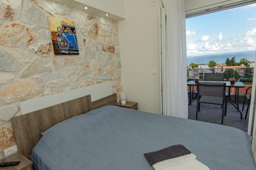 Posteľ alebo postele v izbe v ubytovaní Nika Apartment 2