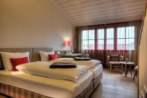 Postel nebo postele na pokoji v ubytování Hotel zur Post