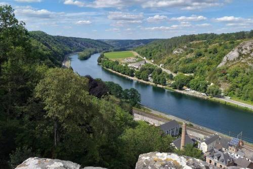 a river in the middle of a valley at Gite de Miavoye calme nature chaleur vue in Onhaye