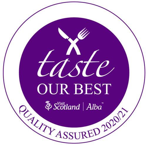 a purple and white sticker with a fork and knife at Lossiemouth House in Lossiemouth