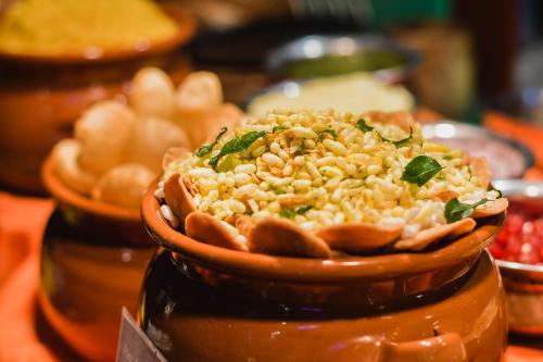 a pile of rice in a bowl on a table at Dusit Thani Dubai in Dubai