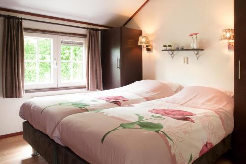 Ліжко або ліжка в номері Mariahoeve-Logies #Polderhuisje