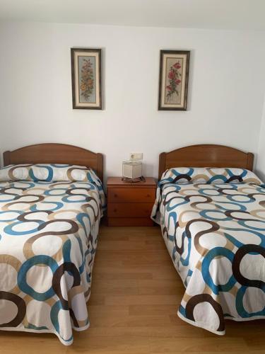 En eller flere senge i et værelse på La Huerta del Rivero