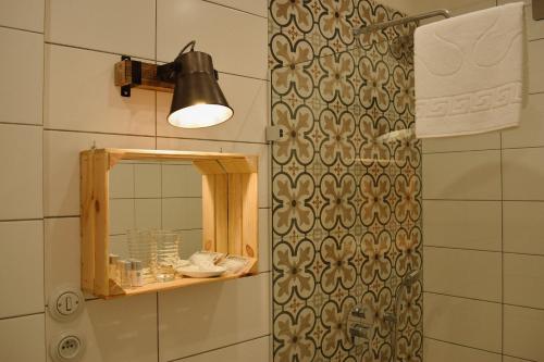 a bathroom with a mirror and a shower at Penzion U Johanky in Kadaň