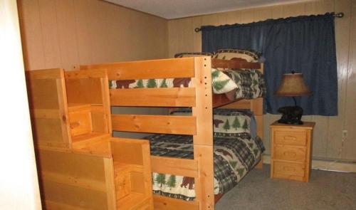 Μία ή περισσότερες κουκέτες σε δωμάτιο στο Rainbow Riverhouse