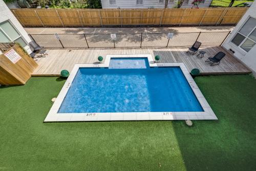 an overhead view of a swimming pool on a lawn at Global Cup The Dallas Vibe and Free Arboretum Tickets in Dallas