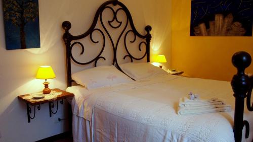 Katil atau katil-katil dalam bilik di Agriturismo La Terra