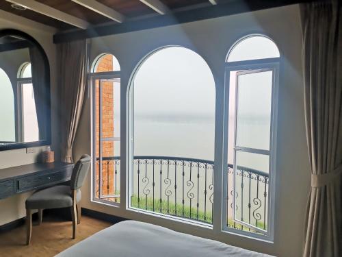 Ένα ή περισσότερα κρεβάτια σε δωμάτιο στο Vera Costa Hotel