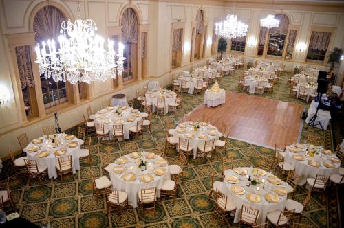 an overhead view of a banquet hall with tables and chandeliers at Hawthorne Hotel in Salem