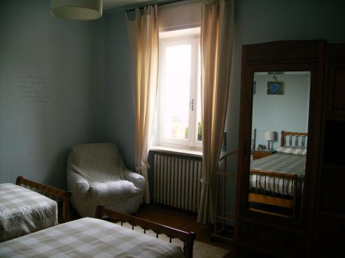 Кровать или кровати в номере Il Barucin