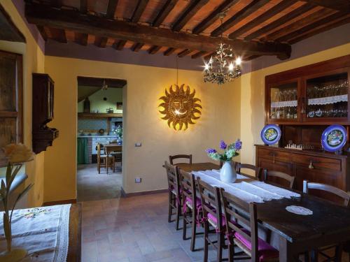 A restaurant or other place to eat at Tuscan Farmhouse in Castiglione di Garfagnana with Garden