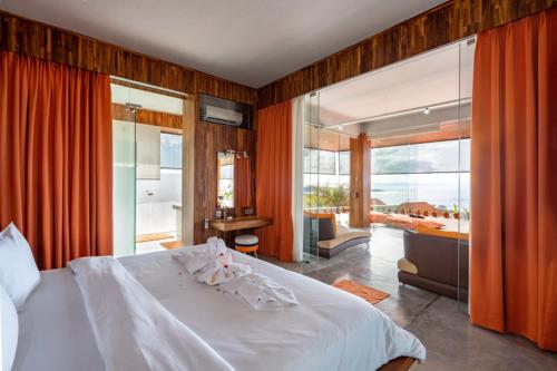 Postel nebo postele na pokoji v ubytování The Arancia Villa