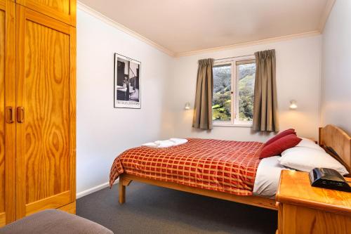 Letto o letti in una camera di Kasees Apartments & Mountain Lodge