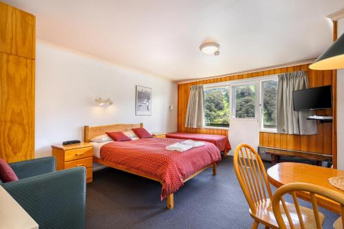 Letto o letti in una camera di Kasees Apartments & Mountain Lodge