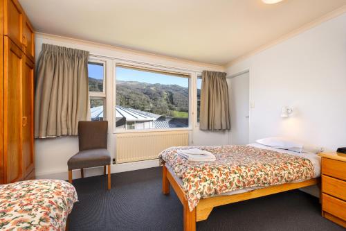 Letto o letti in una camera di Kasees Apartments & Mountain Lodge