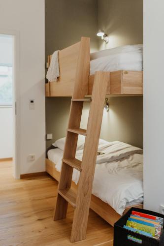 Postel nebo postele na pokoji v ubytování Strandweiss & Strandgrau