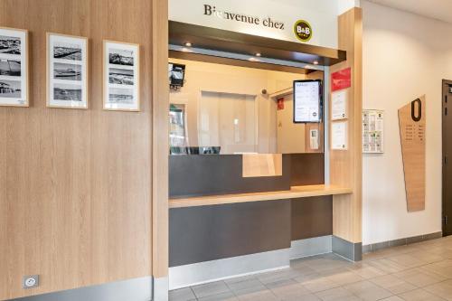 a view of the front of a waiting room at B&B HOTEL Arcachon Gujan-Mestras in Gujan-Mestras