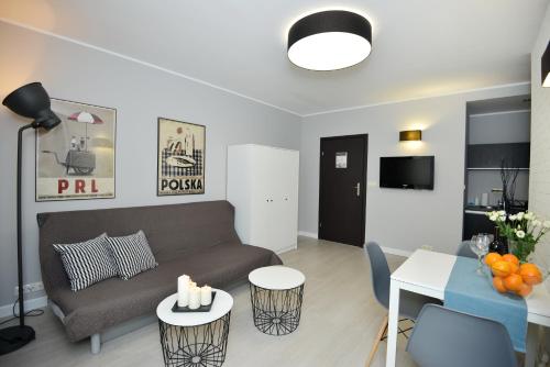 Μια τηλεόραση ή/και κέντρο ψυχαγωγίας στο Apartamenty TOP Garbary