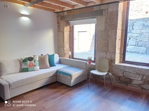 Χώρος καθιστικού στο Casas do Torreão 3 casas de alojamento local