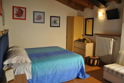Giường trong phòng chung tại Bed & Breakfast Gemma