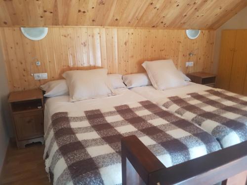 En eller flere senge i et værelse på GLP Sierra nevada 2