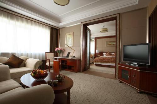 TV a/nebo společenská místnost v ubytování Inn Fine Hotel