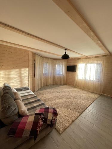 Ein Bett oder Betten in einem Zimmer der Unterkunft Котеджі “Друзі”