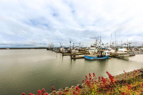 a group of boats docked at a dock in the water at Ocean Avenue Condos in Westport