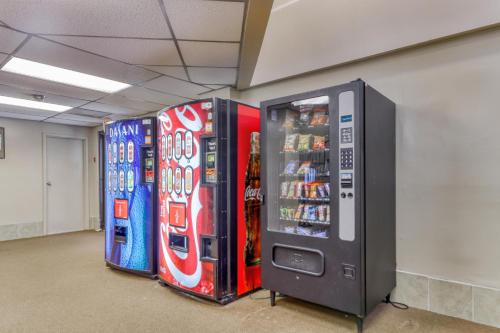 two vending machines are lined up next to a wall at Pinnacle in Beech Mountain