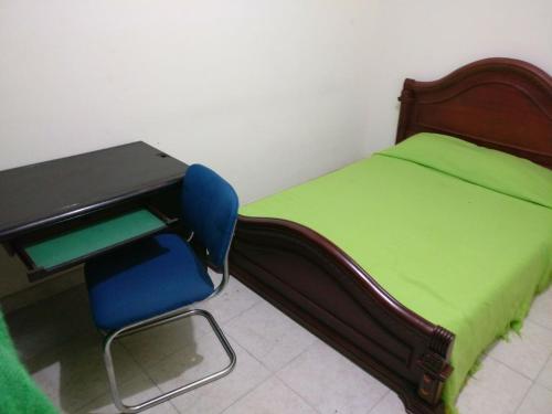 Postel nebo postele na pokoji v ubytování Hotel Ejecutivo Imperial