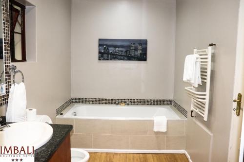 Ένα μπάνιο στο Imbali Boutique Hotel