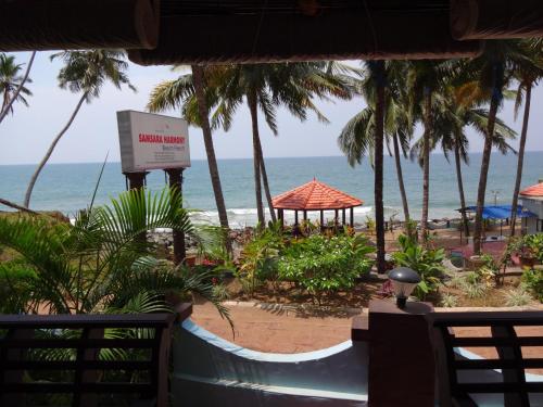 a view of the beach from the resort at Samsara Harmony Beach Resort in Varkala
